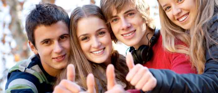 Four Teens Smiling